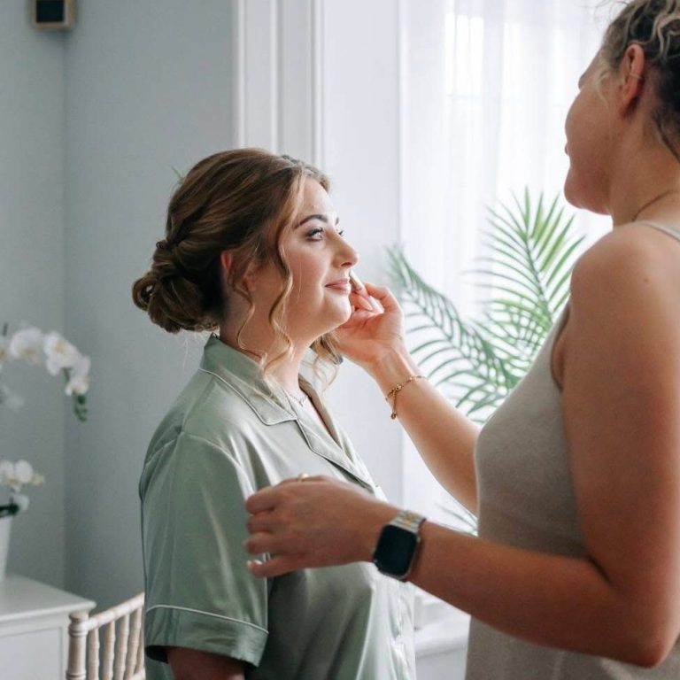 Luxury bridal makeup in progress at Whirlowbrook Hall, Sheffield, with the bride having professional wedding makeup applied by Mollywood